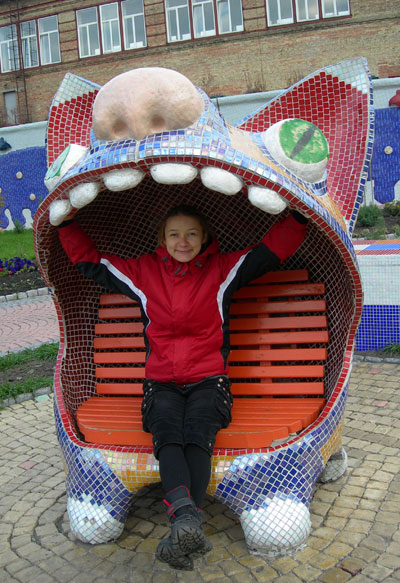 Olga in the mouth of a cat.